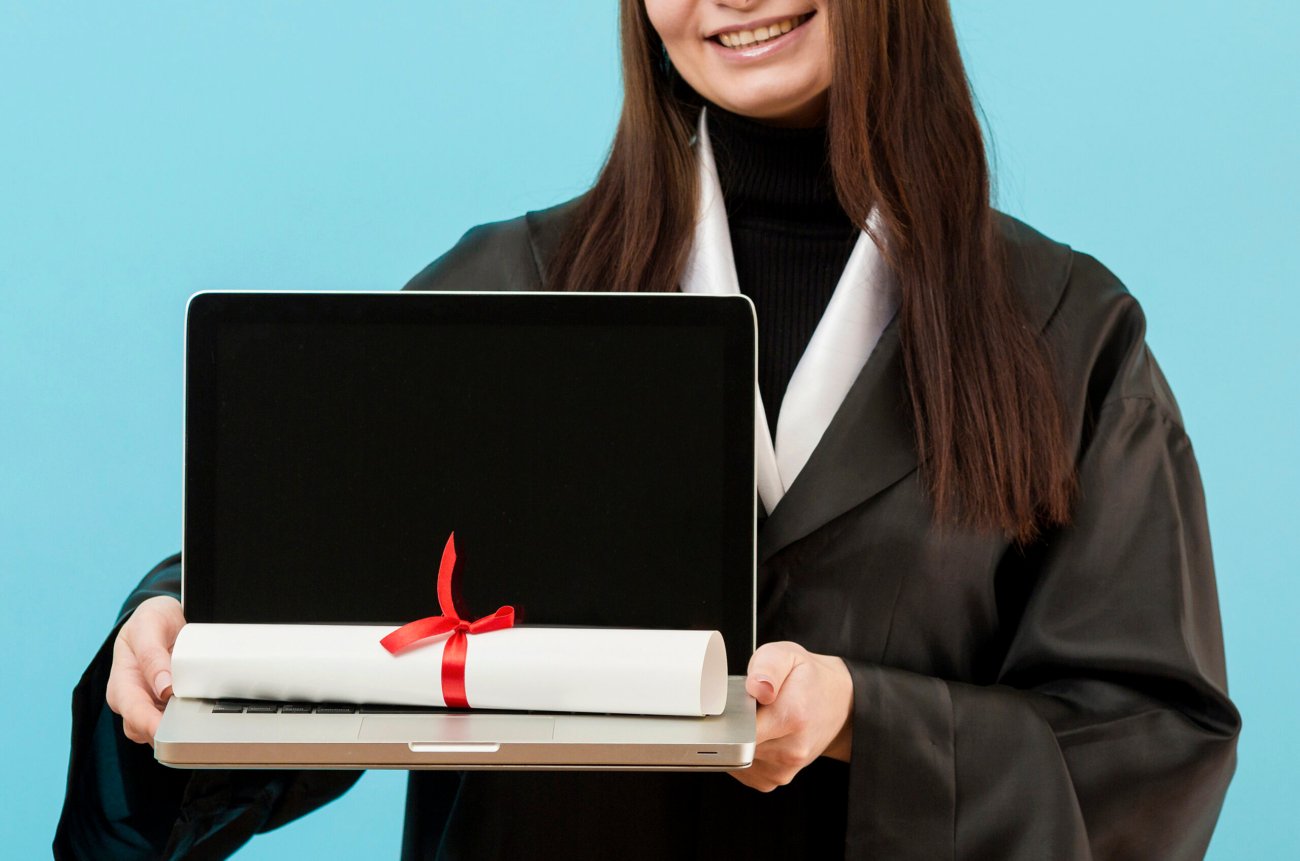close-up-girl-holding-laptop
